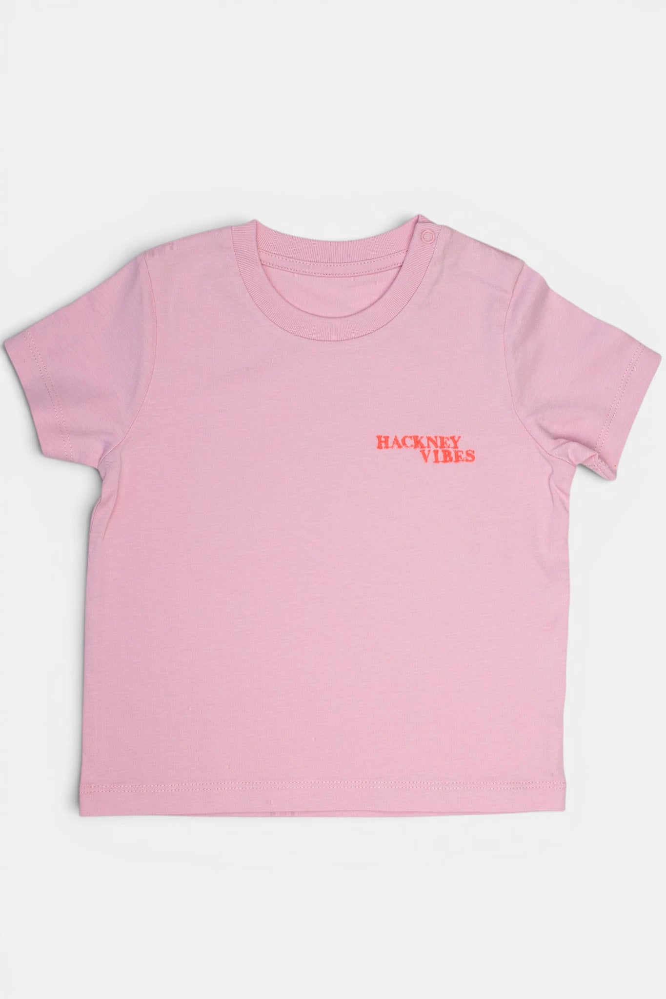 Light pink kids T-shirt with fluorescent coral orange Hackney Vibes embroidery
